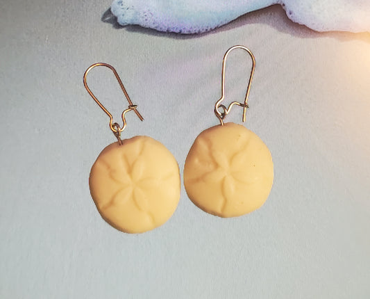 Glowing sand dollar earrings