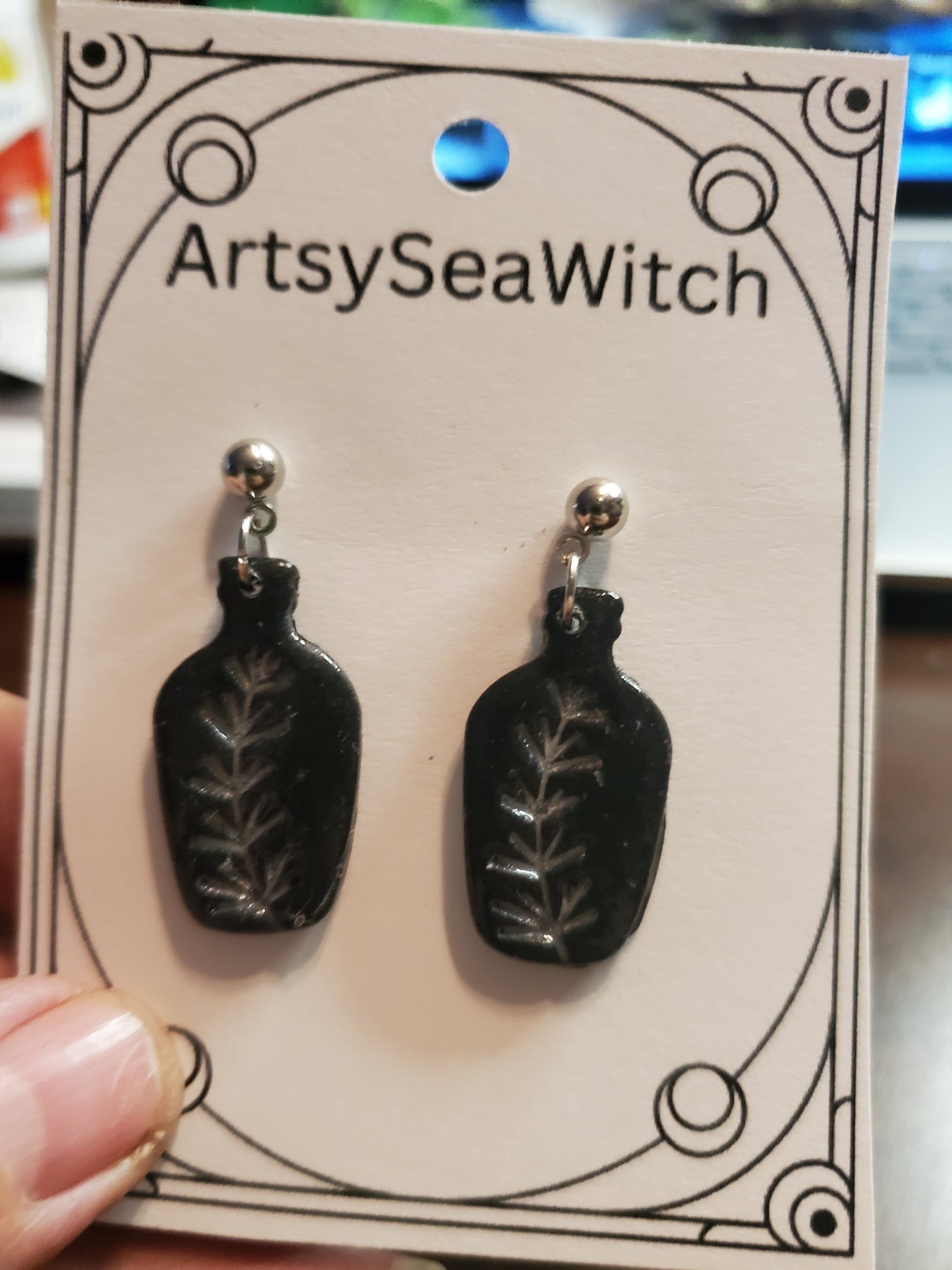 Potion bottle earrings