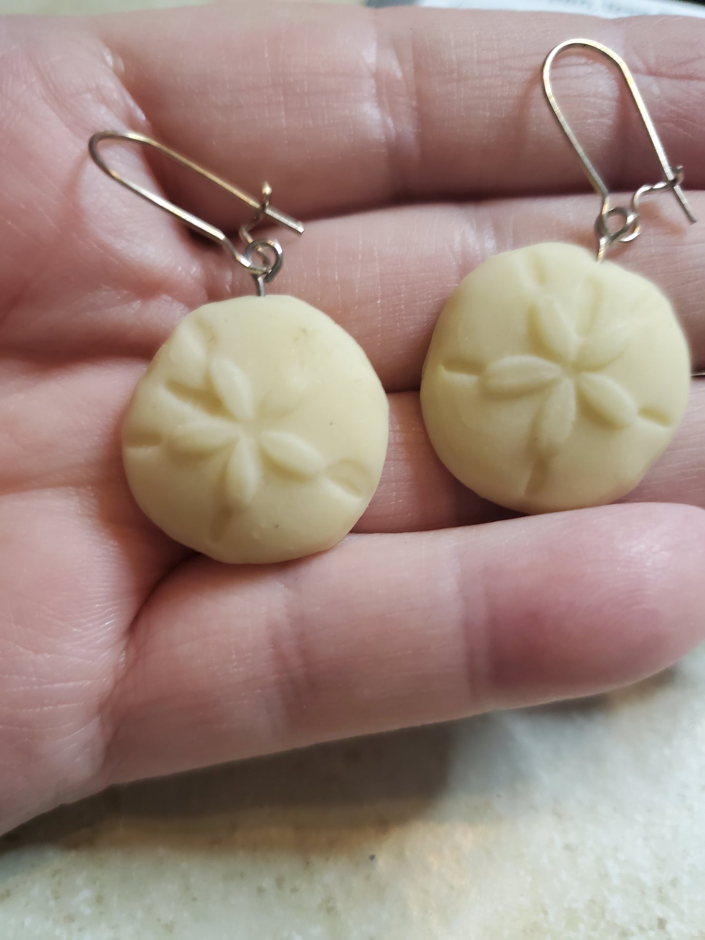Glowing sand dollar earrings