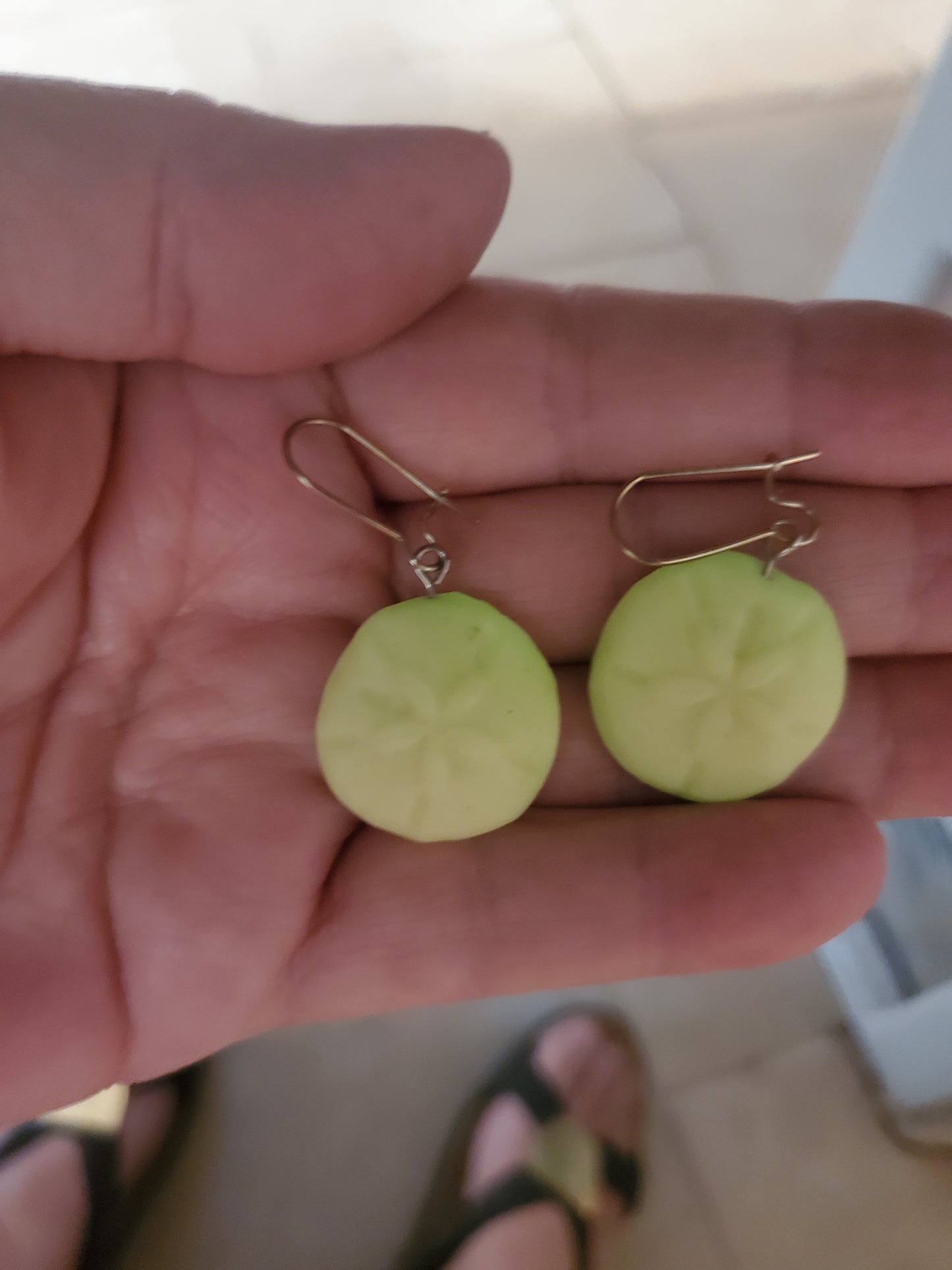 Glowing sand dollar earrings