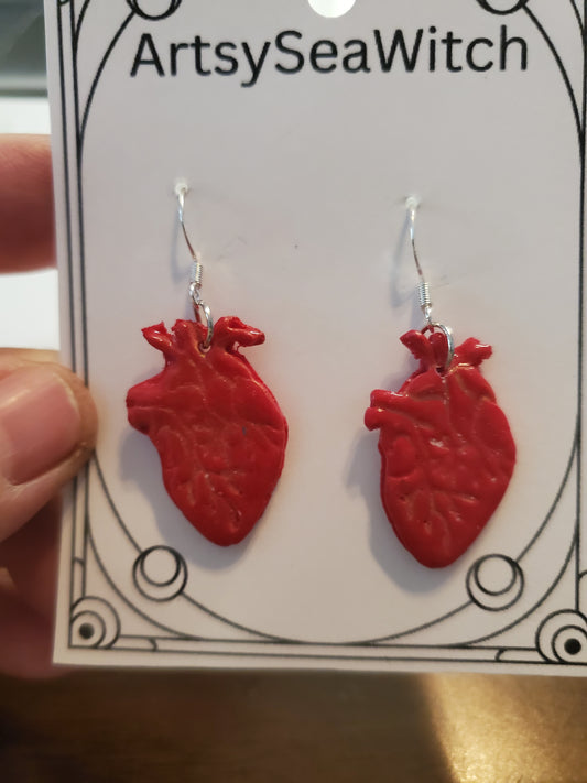 Human heart earrings