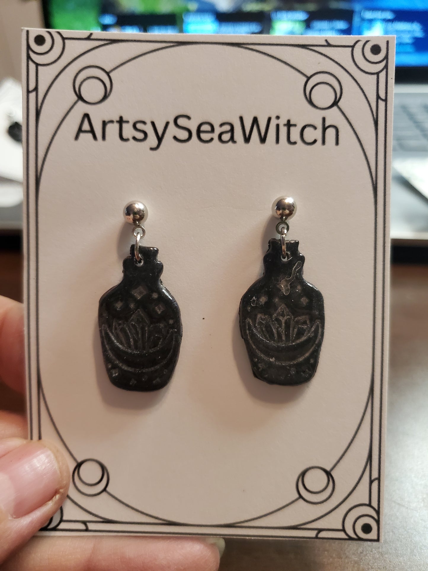 Potion bottle earrings